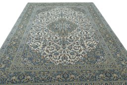 Surface texture of 2000s Kashan rug with natural Wool and intricate pattern