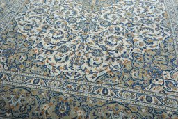 Close-up detail of 2000s Kashan rug from Iran / Persia showing Wool weave