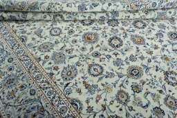 Close-up detail of 2000s Kashan rug from Iran / Persia showing Wool weave