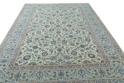 Surface texture of 2000s Kashan rug with natural Wool and intricate pattern