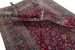 Surface texture of 2000s Kashan rug with natural Wool and intricate pattern