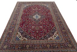 Surface texture of 2000s Kashan rug with natural Wool and intricate pattern