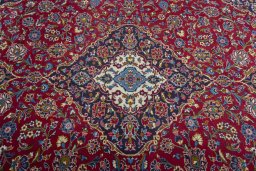 Central medallion detail of 2000s Kashan rug from Iran / Persia