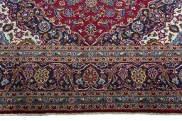 Full view of 2000s Kashan rug from Iran / Persia, 348 × 251 cm in Red tones