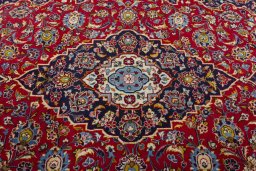 Central medallion detail of 2000s Kashan rug from Iran / Persia