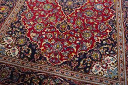 Close-up detail of 2000s Kashan rug from Iran / Persia showing Wool weave