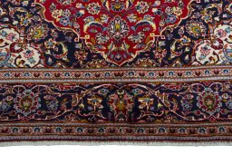 Full view of 2000s Kashan rug from Iran / Persia, 317 × 201 cm in Red tones