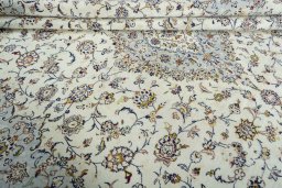 Close-up detail of 2000s Kashan rug from Iran / Persia showing Wool weave