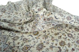 Surface texture of 2000s Kashan rug with natural Wool and intricate pattern
