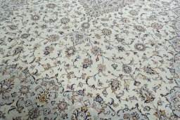 Close-up detail of 2000s Kashan rug from Iran / Persia showing Wool weave