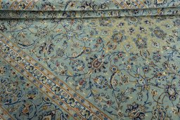 Close-up detail of 2000s Kashan rug from Iran / Persia showing Wool weave