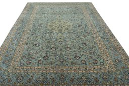 Surface texture of 2000s Kashan rug with natural Wool and intricate pattern