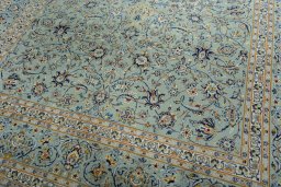Close-up detail of 2000s Kashan rug from Iran / Persia showing Wool weave