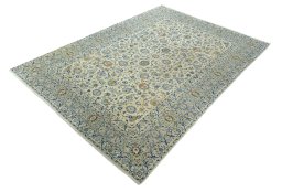 Corner detail of 2000s Kashan rug showing border pattern and Wool pile