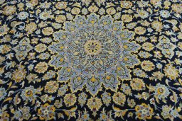 Central medallion detail of 2000s Kashan rug from Iran / Persia