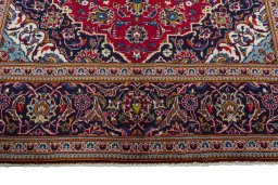 Full view of 2000s Kashan rug from Iran / Persia, 305 × 197 cm in Red tones