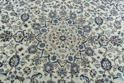 Central medallion detail of 2000s Kashan rug from Iran / Persia