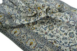 Surface texture of 2000s Kashan rug with natural Wool and intricate pattern