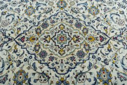 Central medallion detail of 2000s Kashan rug from Iran / Persia