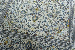 Close-up detail of 2000s Kashan rug from Iran / Persia showing Wool weave