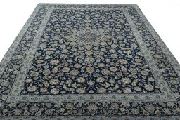 Surface texture of 2000s Kashan rug with natural Wool and intricate pattern