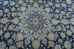 Central medallion detail of 2000s Kashan rug from Iran / Persia