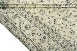 Close-up detail of New Kashan rug from Iran / Persia showing Wool weave