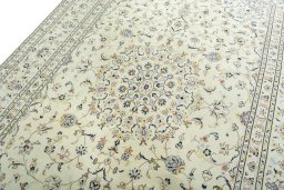 Backside of handmade New Kashan rug showing knot structure and weave density