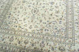 Close-up detail of New Kashan rug from Iran / Persia showing Wool weave