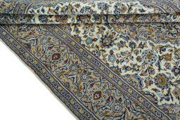 Close-up detail of 2000s Kashan rug from Iran / Persia showing Wool weave