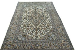 Surface texture of 2000s Kashan rug with natural Wool and intricate pattern