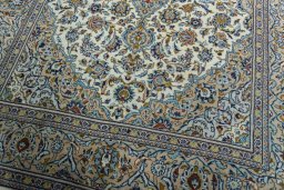 Close-up detail of 2000s Kashan rug from Iran / Persia showing Wool weave