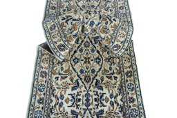 Close-up detail of 2000s Kashan rug from Iran / Persia showing Wool weave