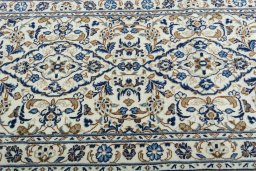 Central medallion detail of 2000s Kashan rug from Iran / Persia