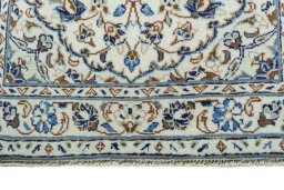 Close-up detail of 2000s Kashan rug from Iran / Persia showing Wool weave