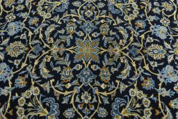 Central medallion detail of 2000s Kashan rug from Iran / Persia