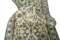 Close-up detail of 2000s Kashan rug from Iran / Persia showing Wool weave