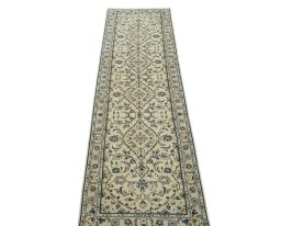 Surface texture of 2000s Kashan rug with natural Wool and intricate pattern