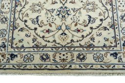 Close-up detail of 2000s Kashan rug from Iran / Persia showing Wool weave