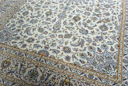 Close-up detail of 2000s Kashan rug from Iran / Persia showing Wool weave
