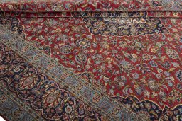 Close-up detail of 2000s Kashan rug from Iran / Persia showing Cork weave