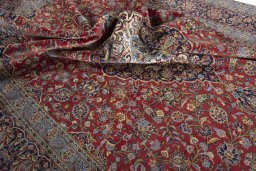 Surface texture of 2000s Kashan rug with natural Cork and intricate pattern