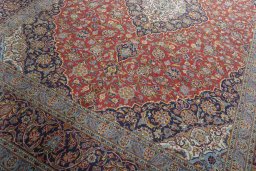 Close-up detail of 2000s Kashan rug from Iran / Persia showing Cork weave