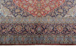 Full view of 2000s Kashan rug from Iran / Persia, 406 × 301 cm in Red tones