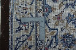 Surface texture of 2000s Kashan rug with natural Wool and intricate pattern