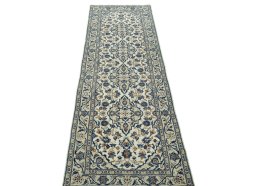 Surface texture of 2000s Kashan rug with natural Wool and intricate pattern