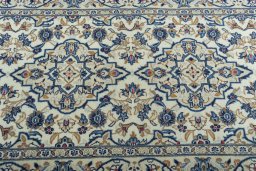 Central medallion detail of 2000s Kashan rug from Iran / Persia