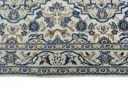 Full view of 2000s Kashan rug from Iran / Persia, 306 × 95 cm in Beige tones