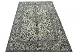 Surface texture of 2000s Kashan rug with natural Wool and intricate pattern
