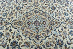 Central medallion detail of 2000s Kashan rug from Iran / Persia